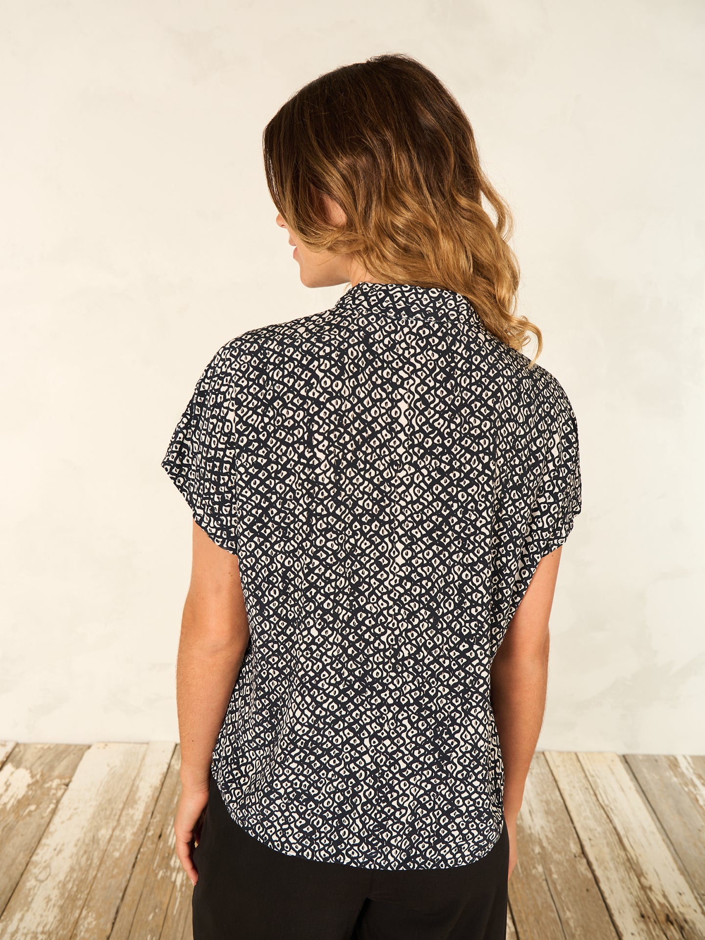 Blouse with button placket