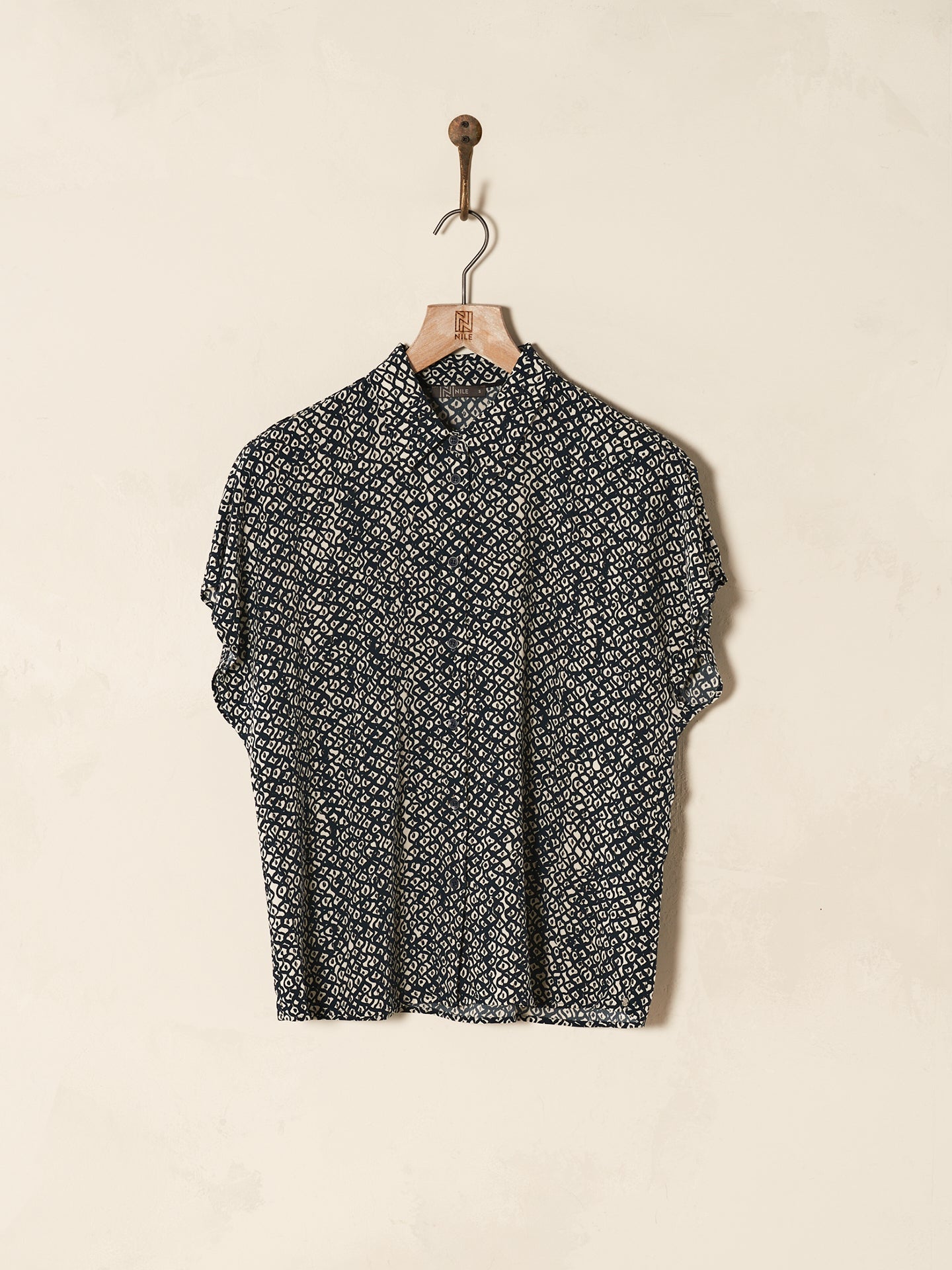 Blouse with button placket