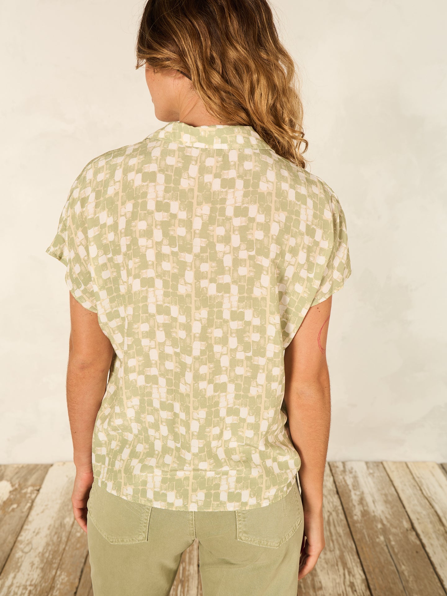 Blouse with button placket