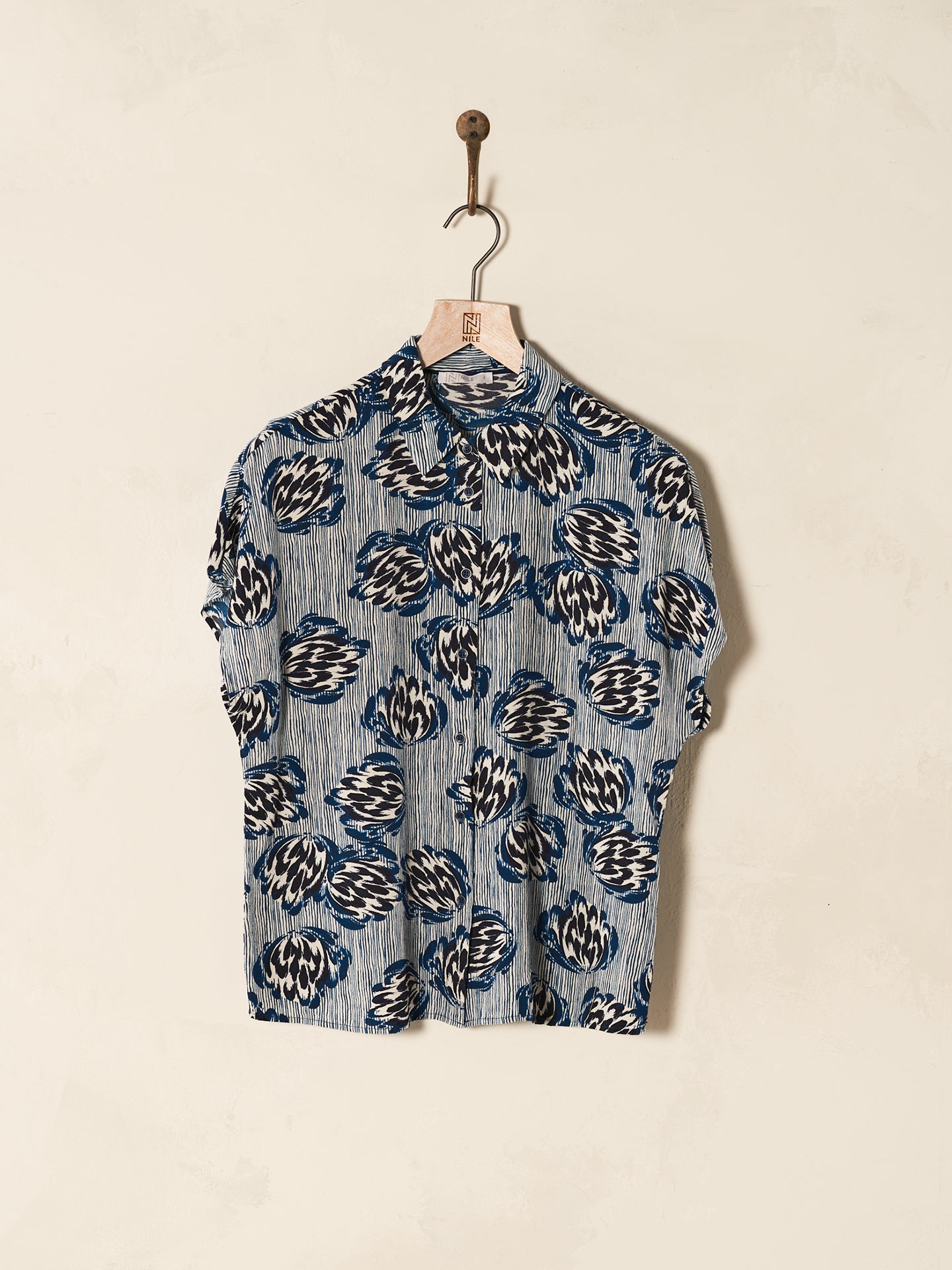 Blouse with button placket
