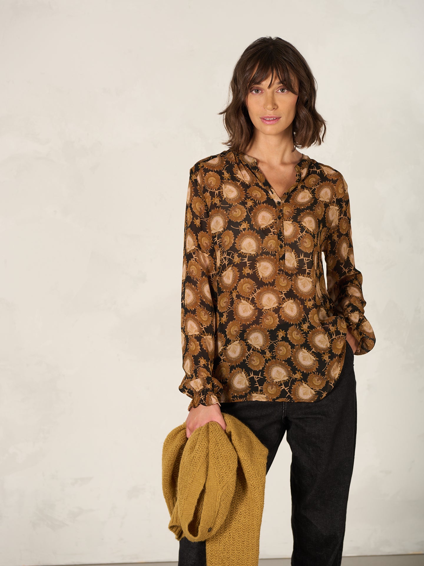 Blouse with button placket