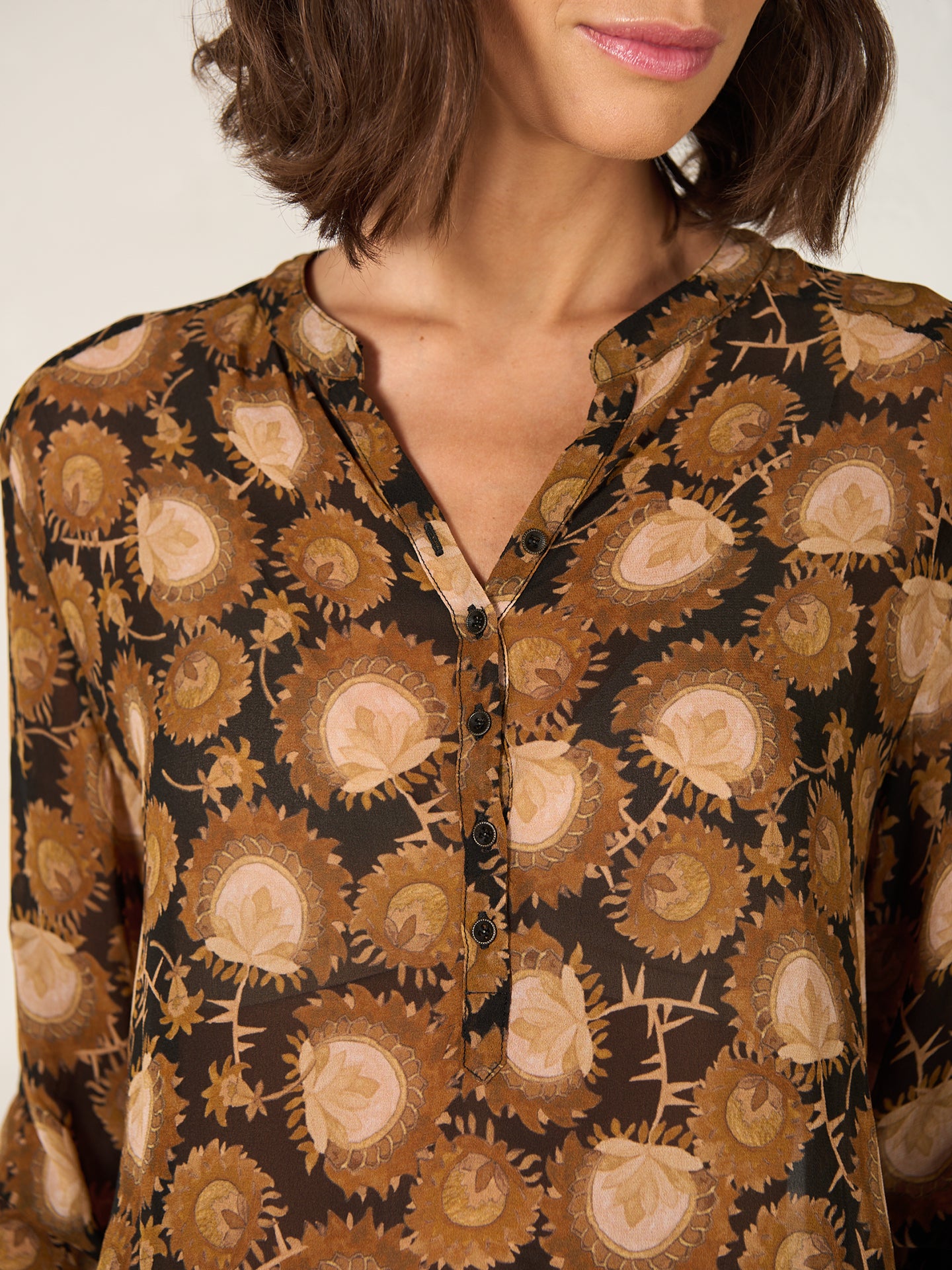 Blouse with button placket