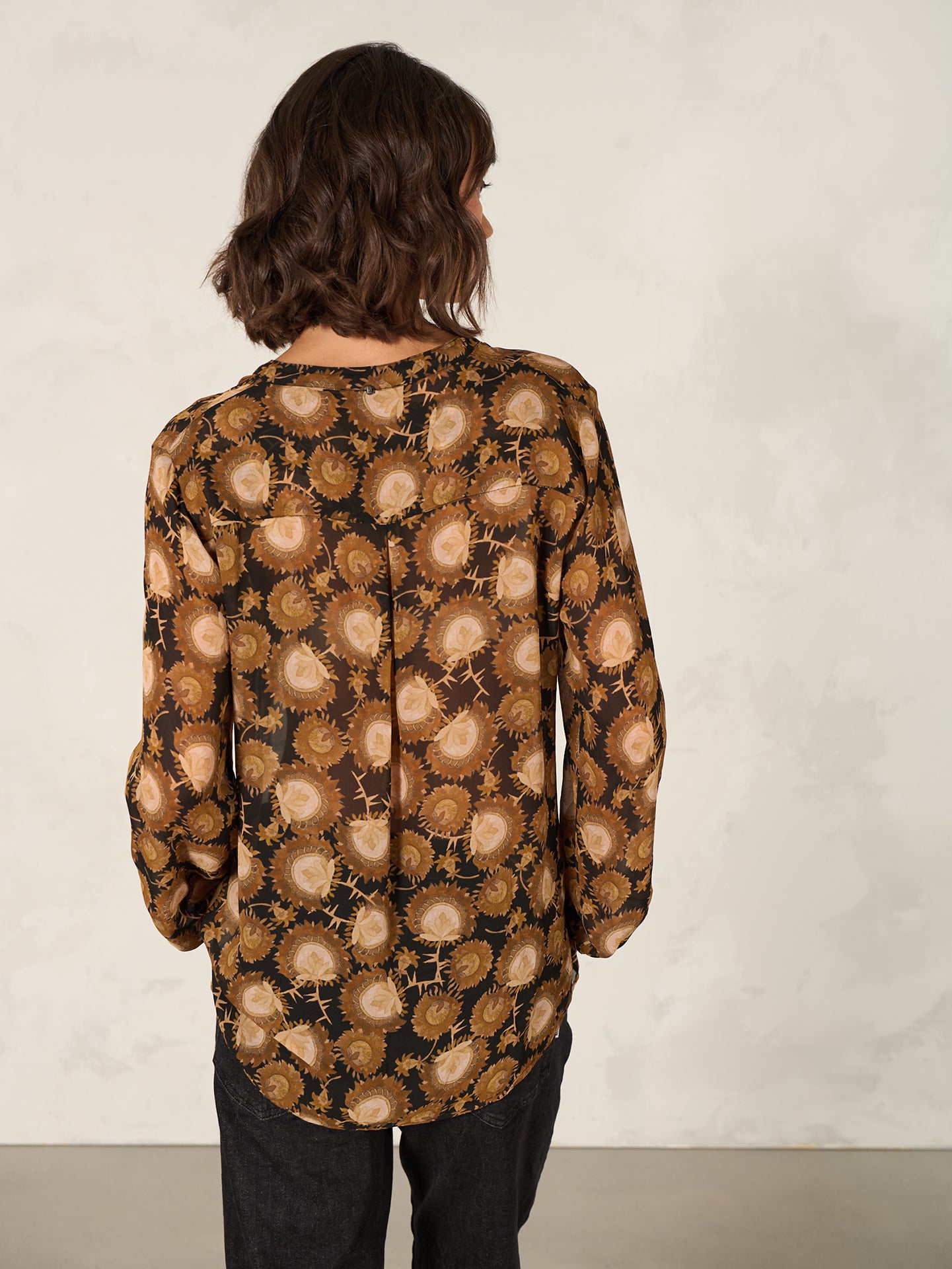 Blouse with button placket