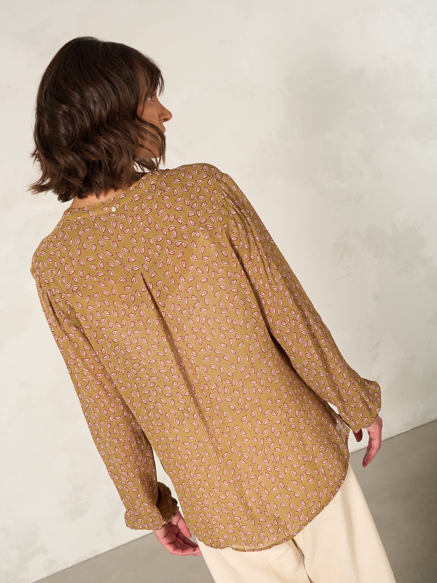 Blouse with button placket