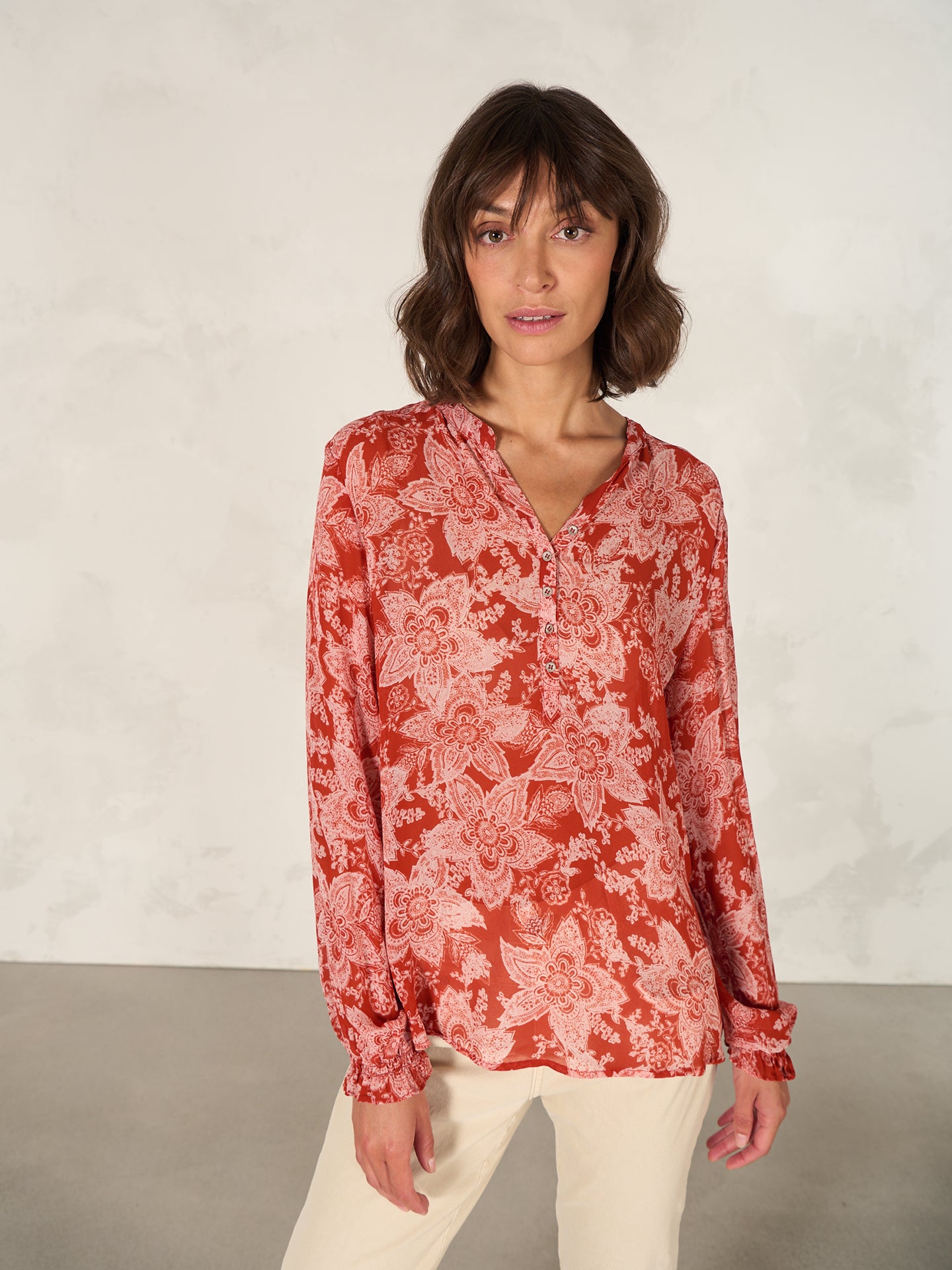 Blouse with button placket