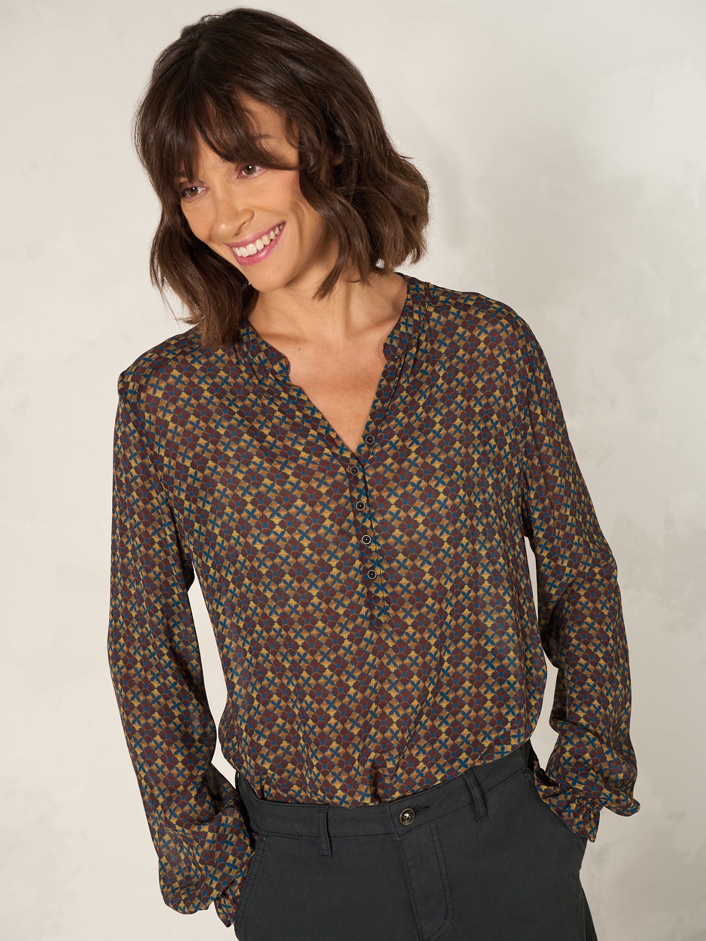 Blouse with button placket