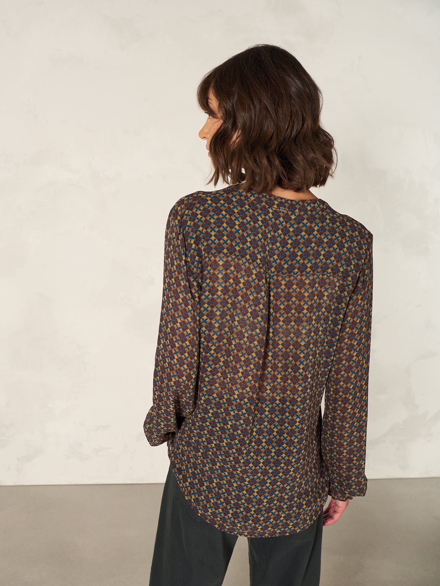Blouse with button placket