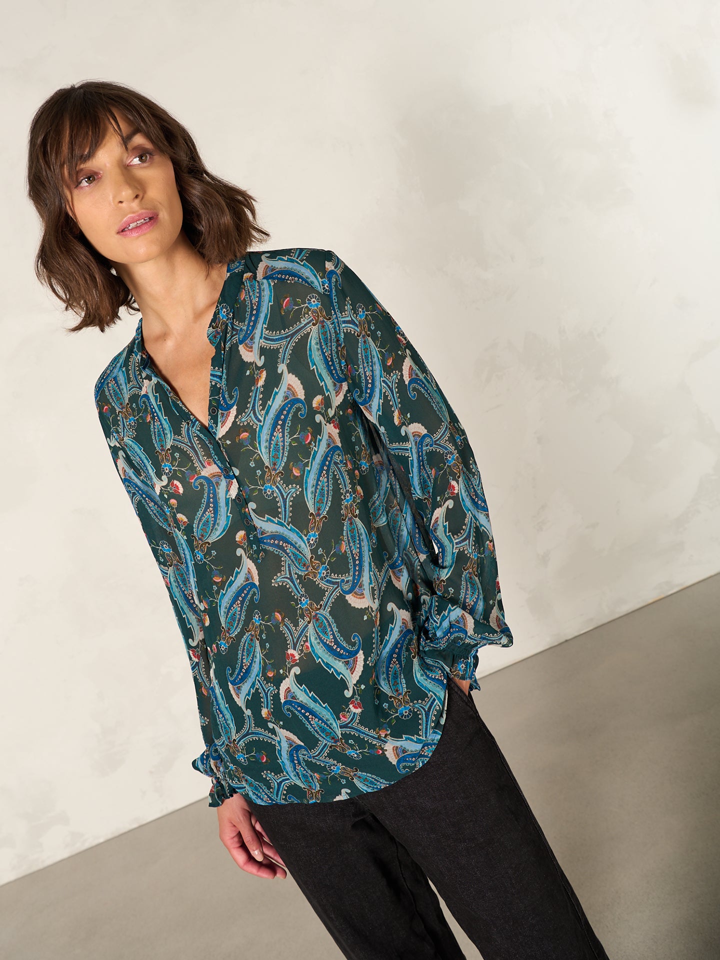 Blouse with button placket