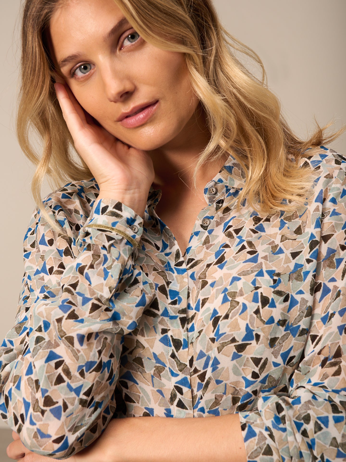 Blouse with button placket