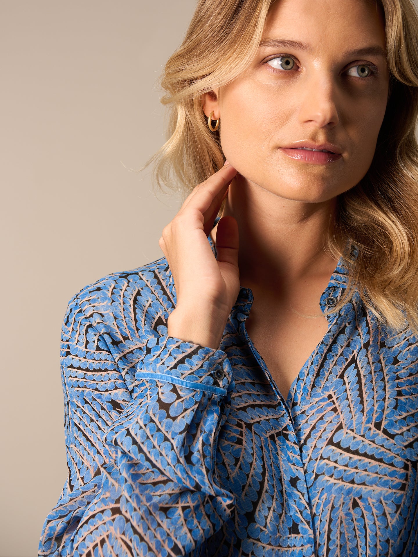 Blouse with button placket