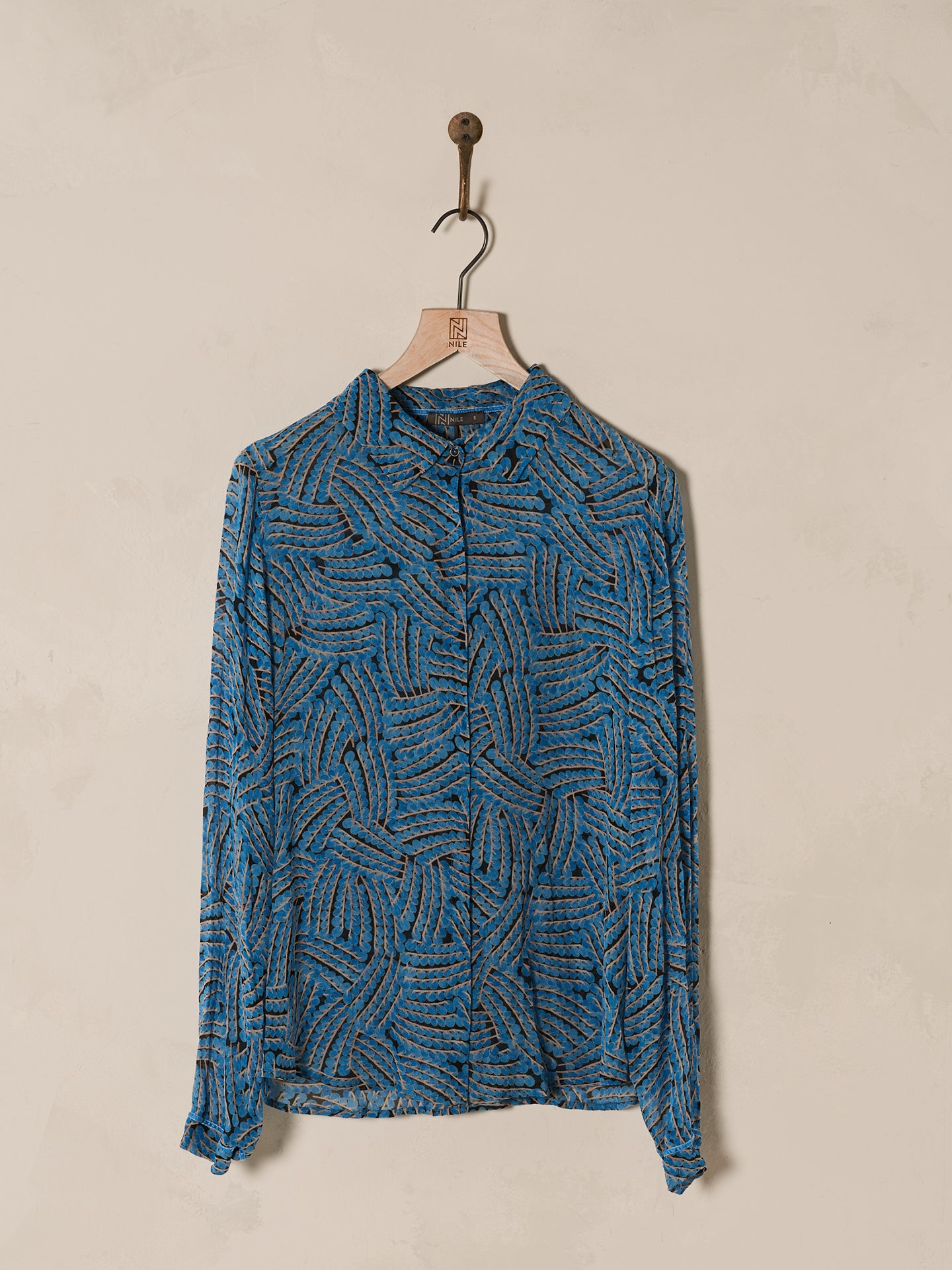 Blouse with button placket