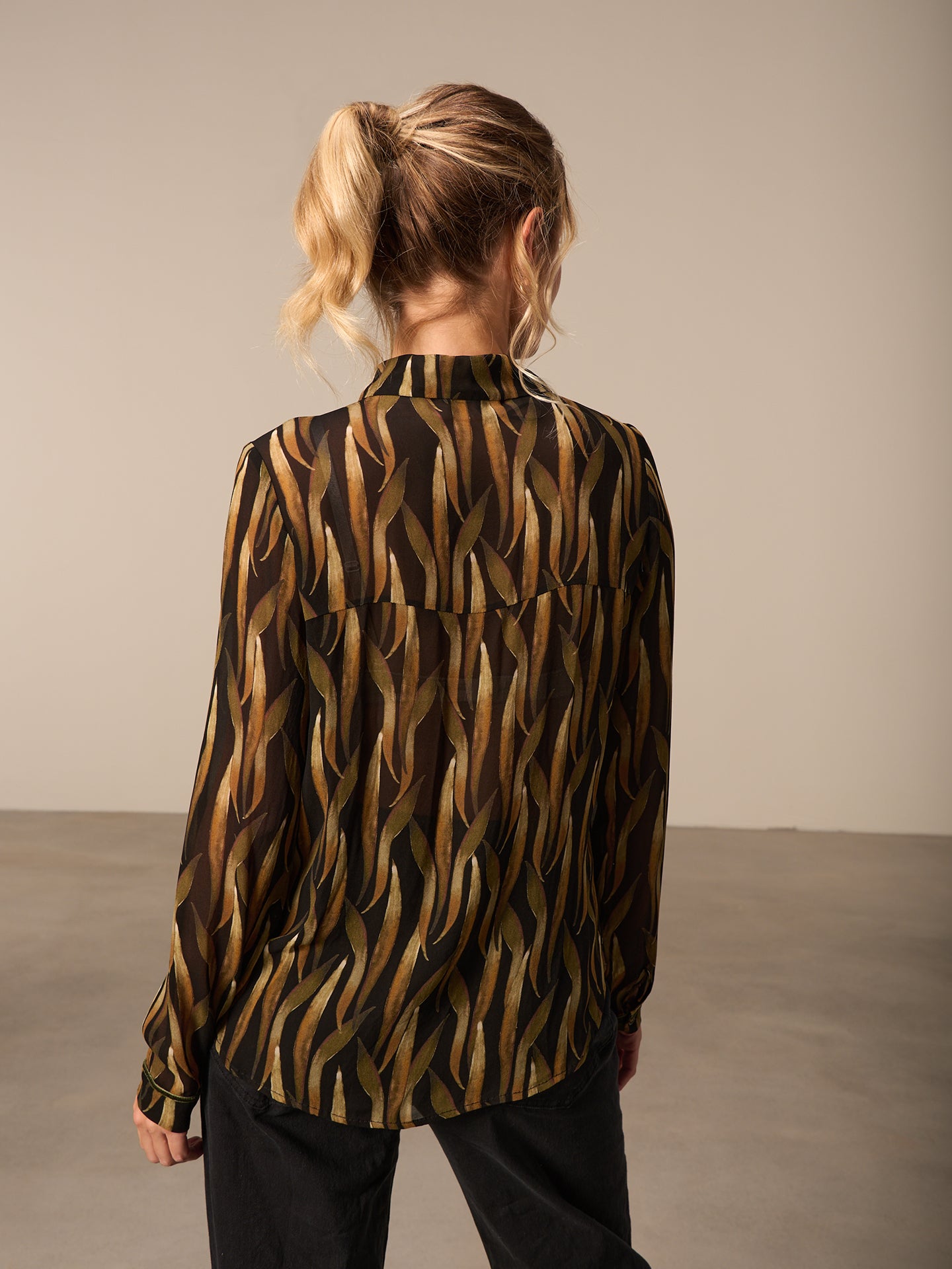 Blouse with button placket