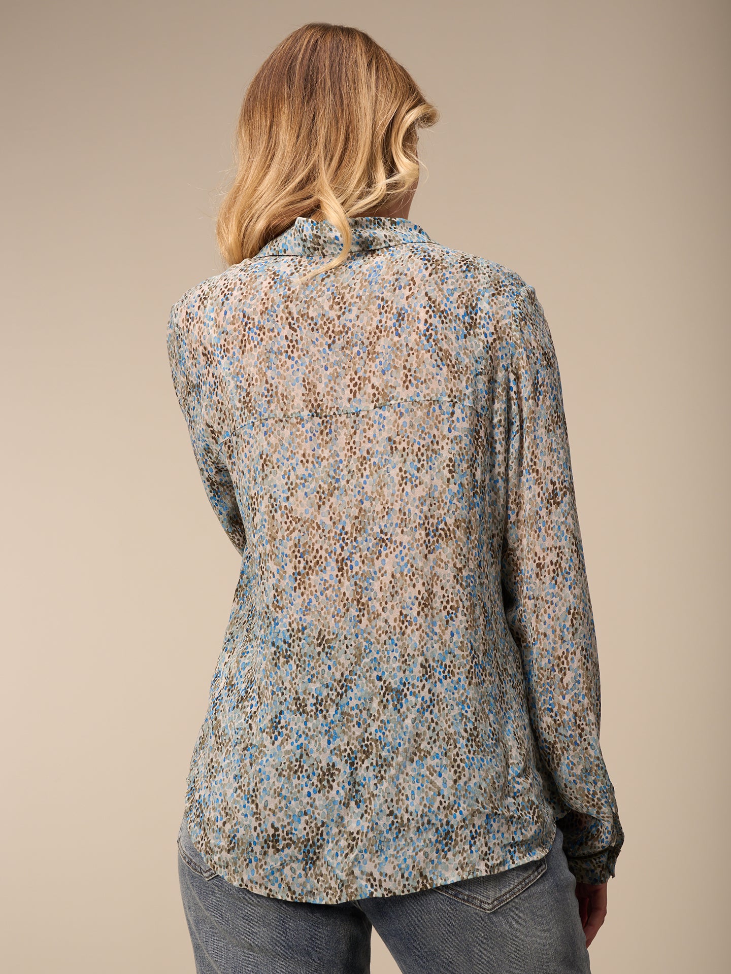 Blouse with button placket