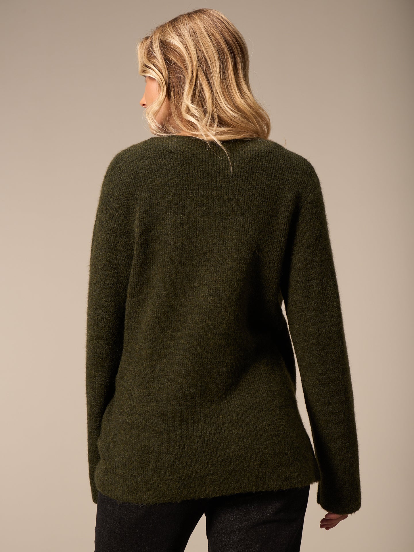 Strickjacke gewickelt