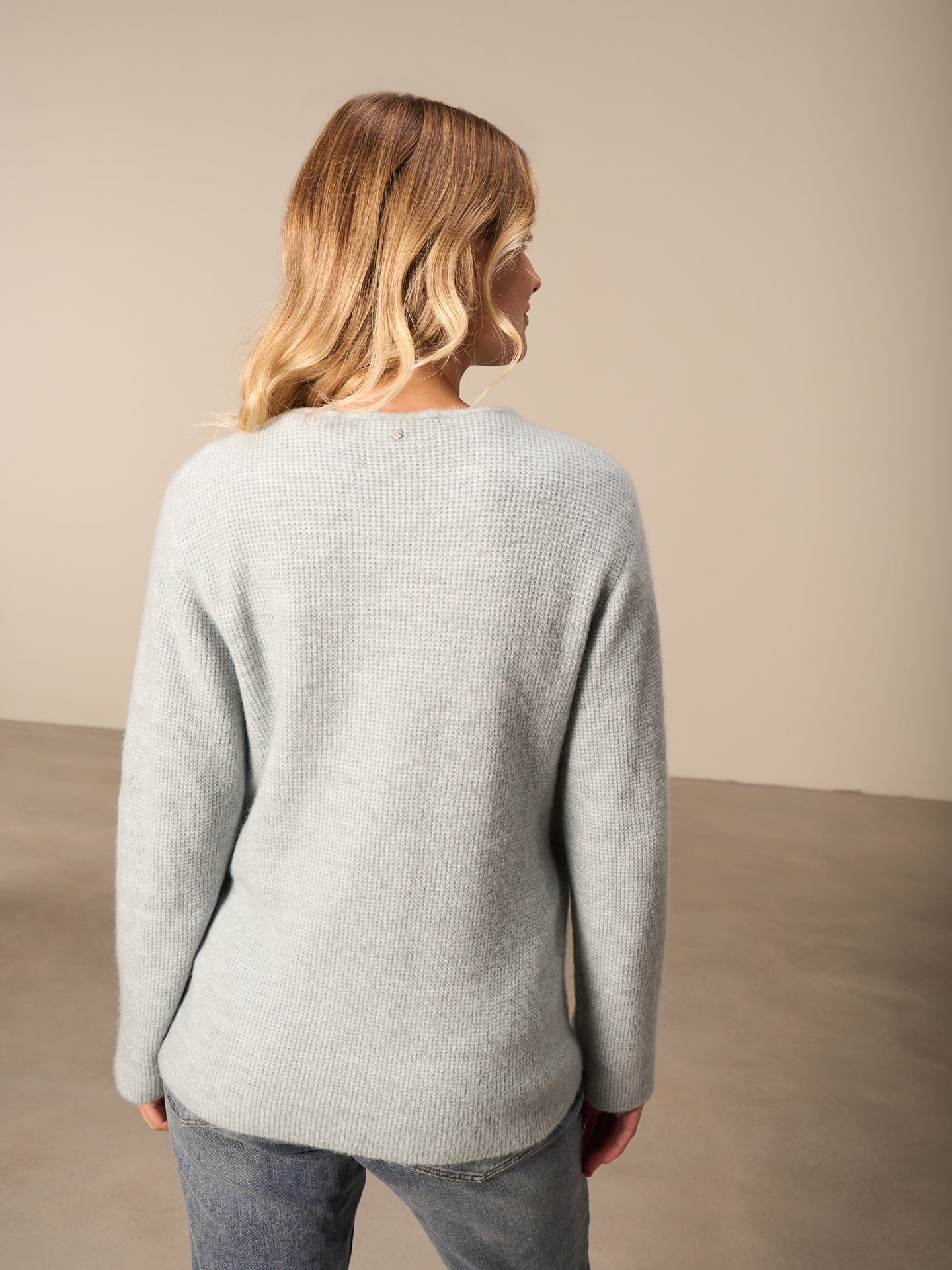 Strickjacke gewickelt
