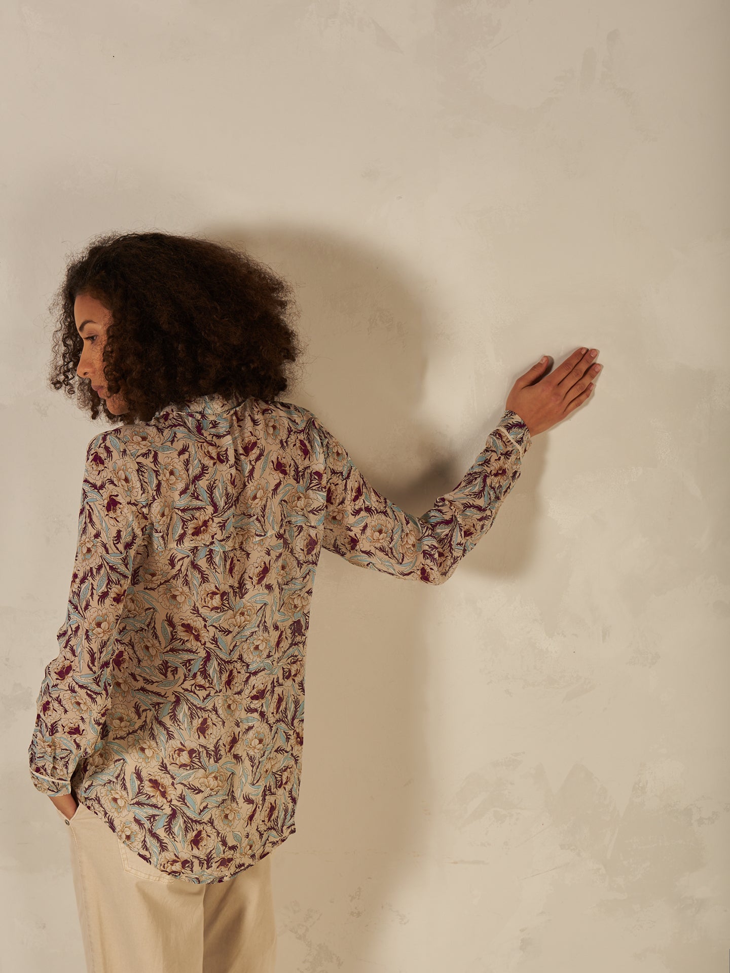 Blusa con abbottonatura