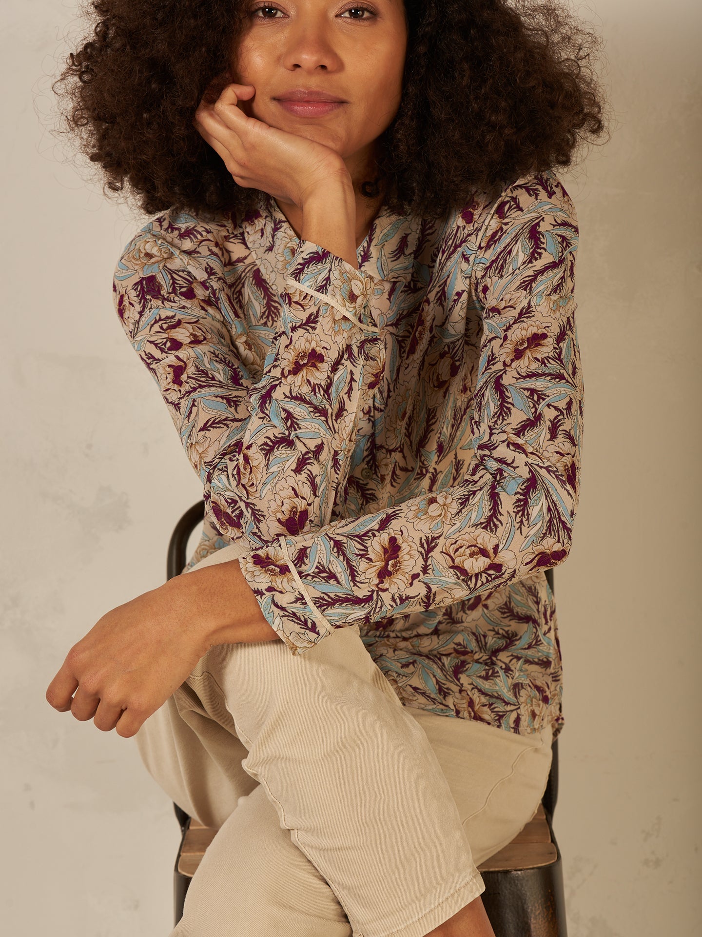 Blusa con abbottonatura