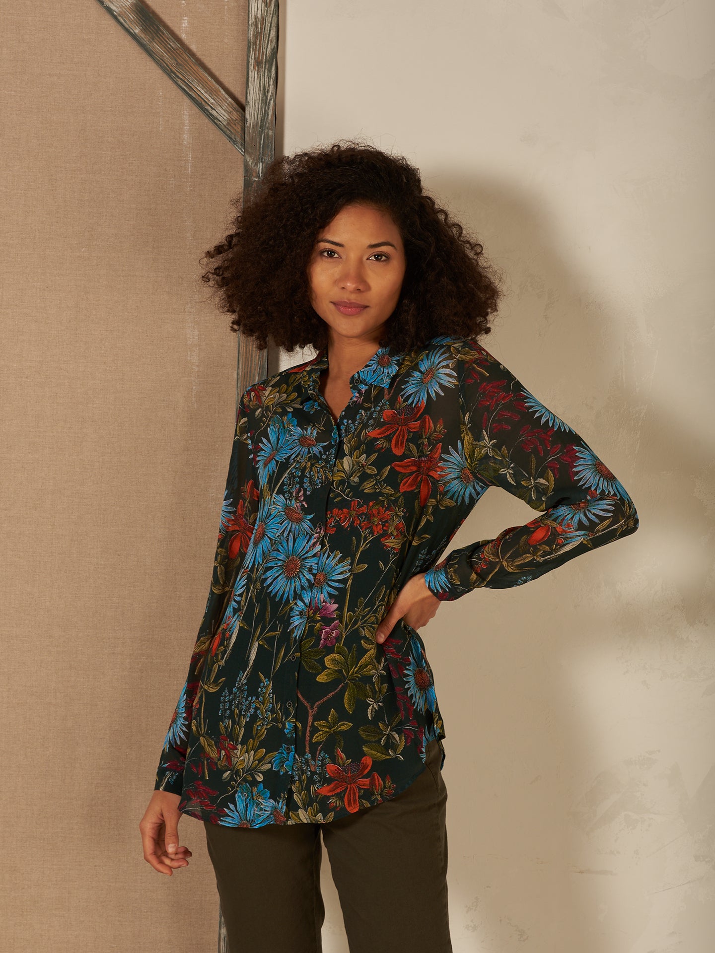 Blusa con abbottonatura