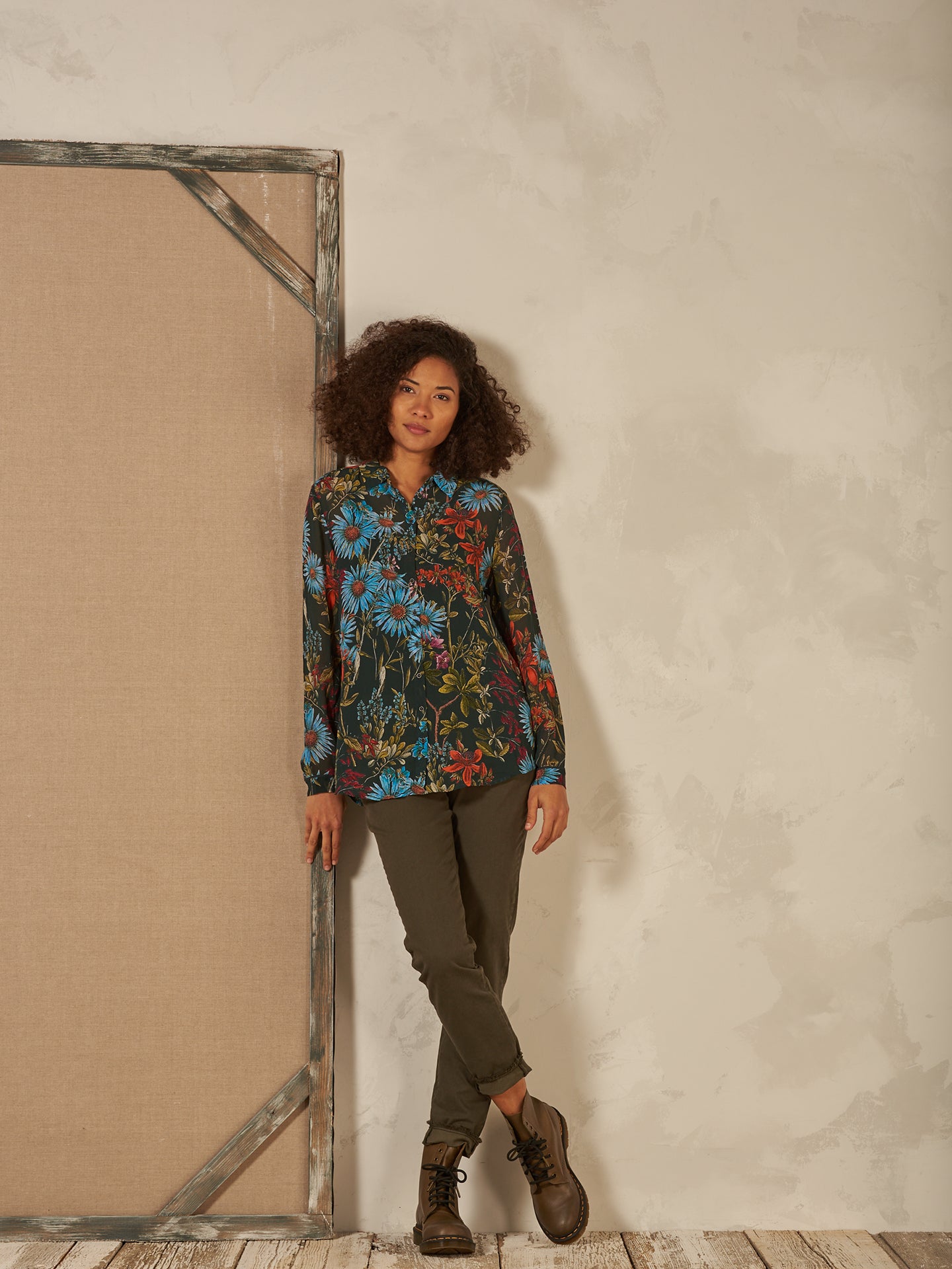 Blusa con abbottonatura