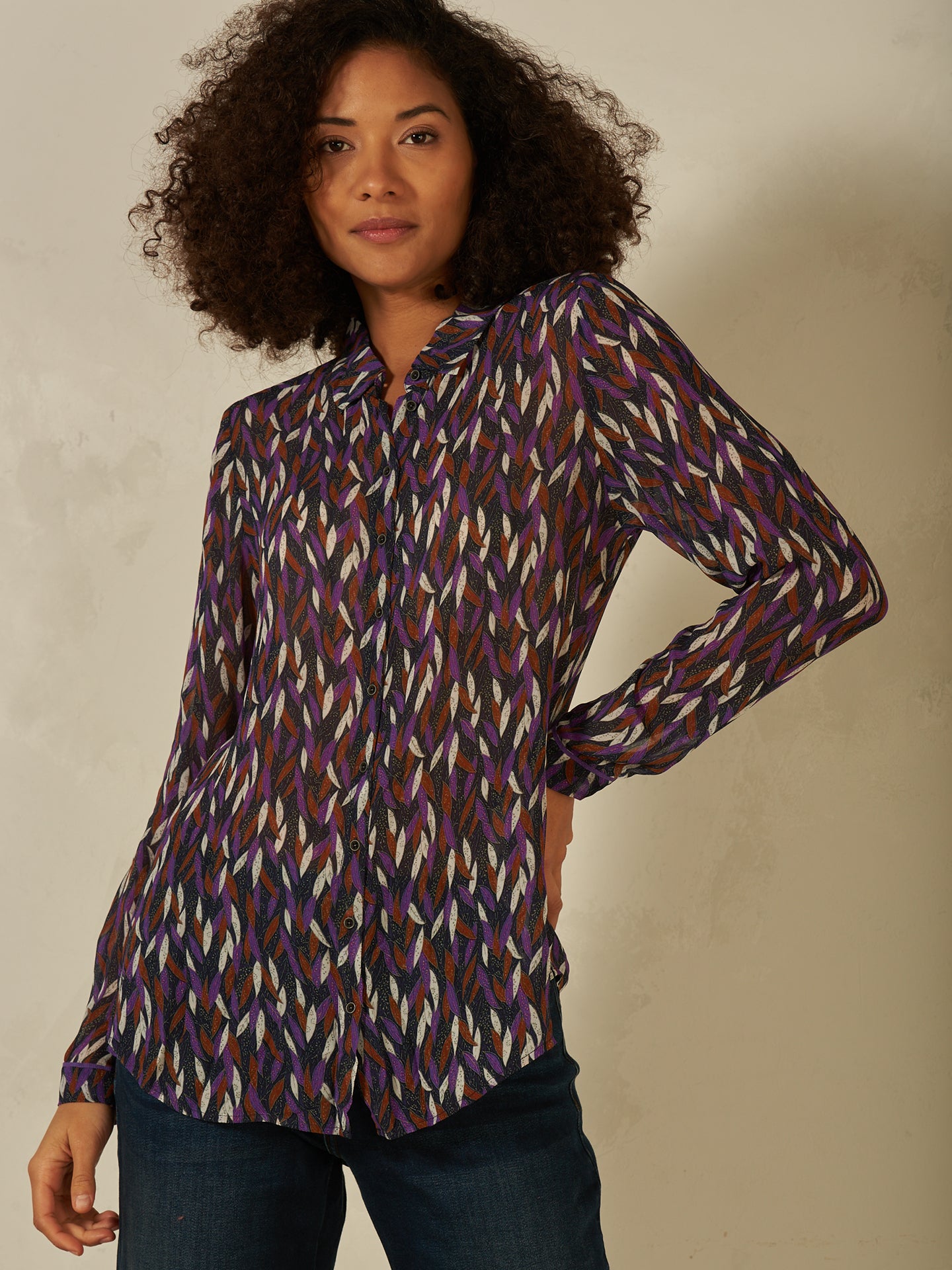 Blusa con abbottonatura