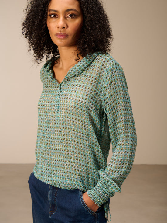 Blusa con cappuccio