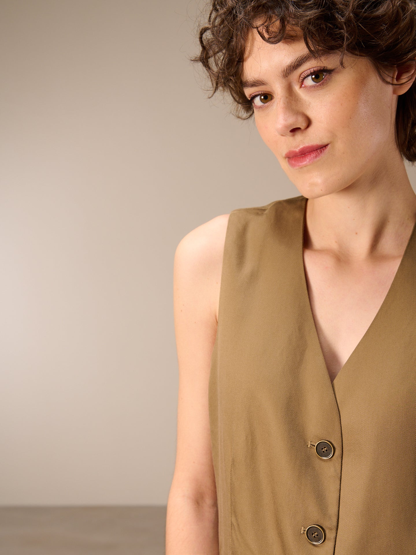 Gilet con chiusura con bottoni