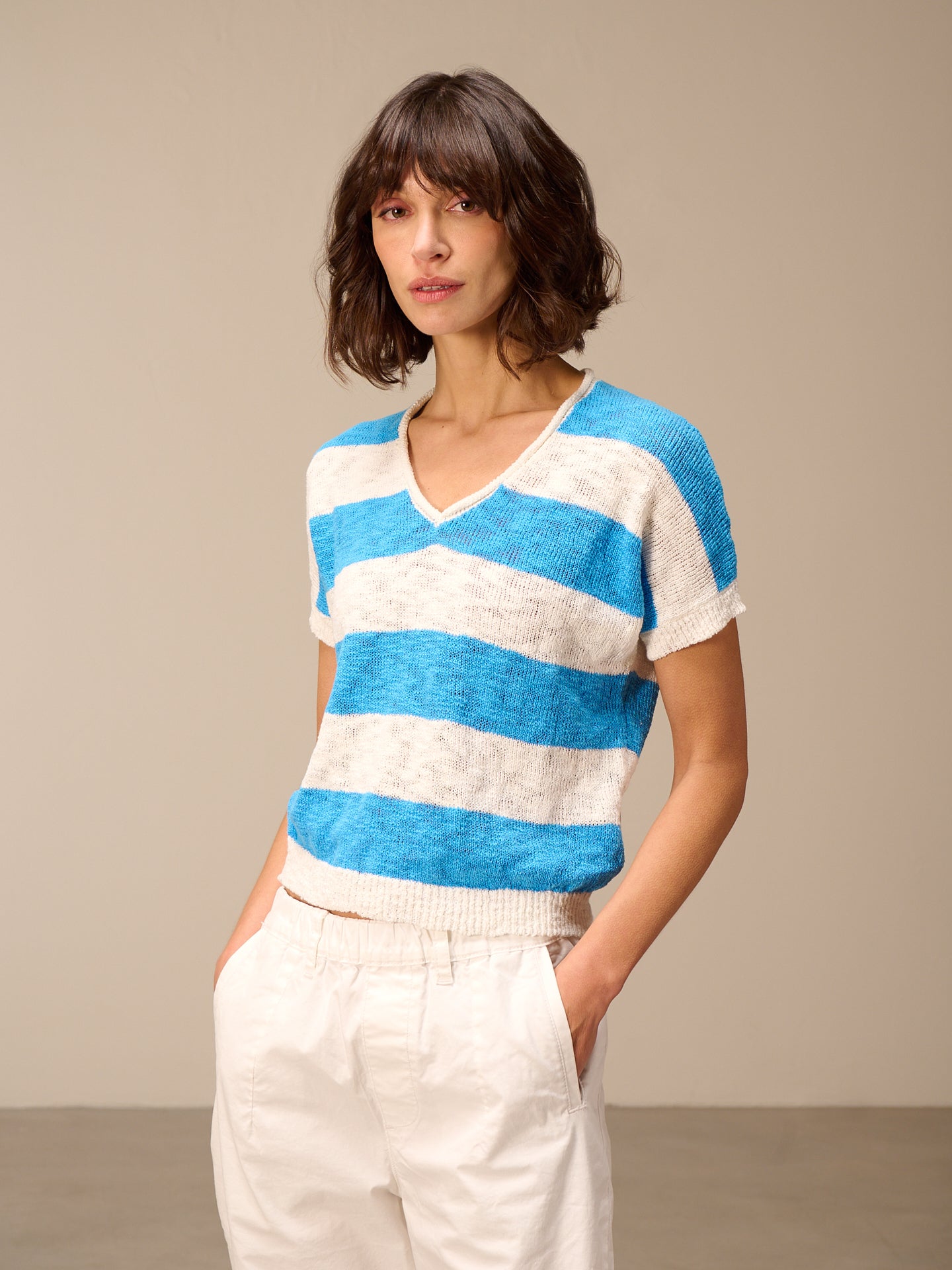 Smanicato con scollo a V