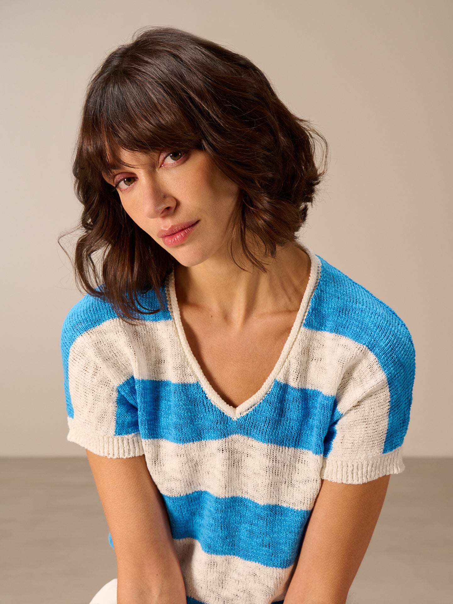 Smanicato con scollo a V