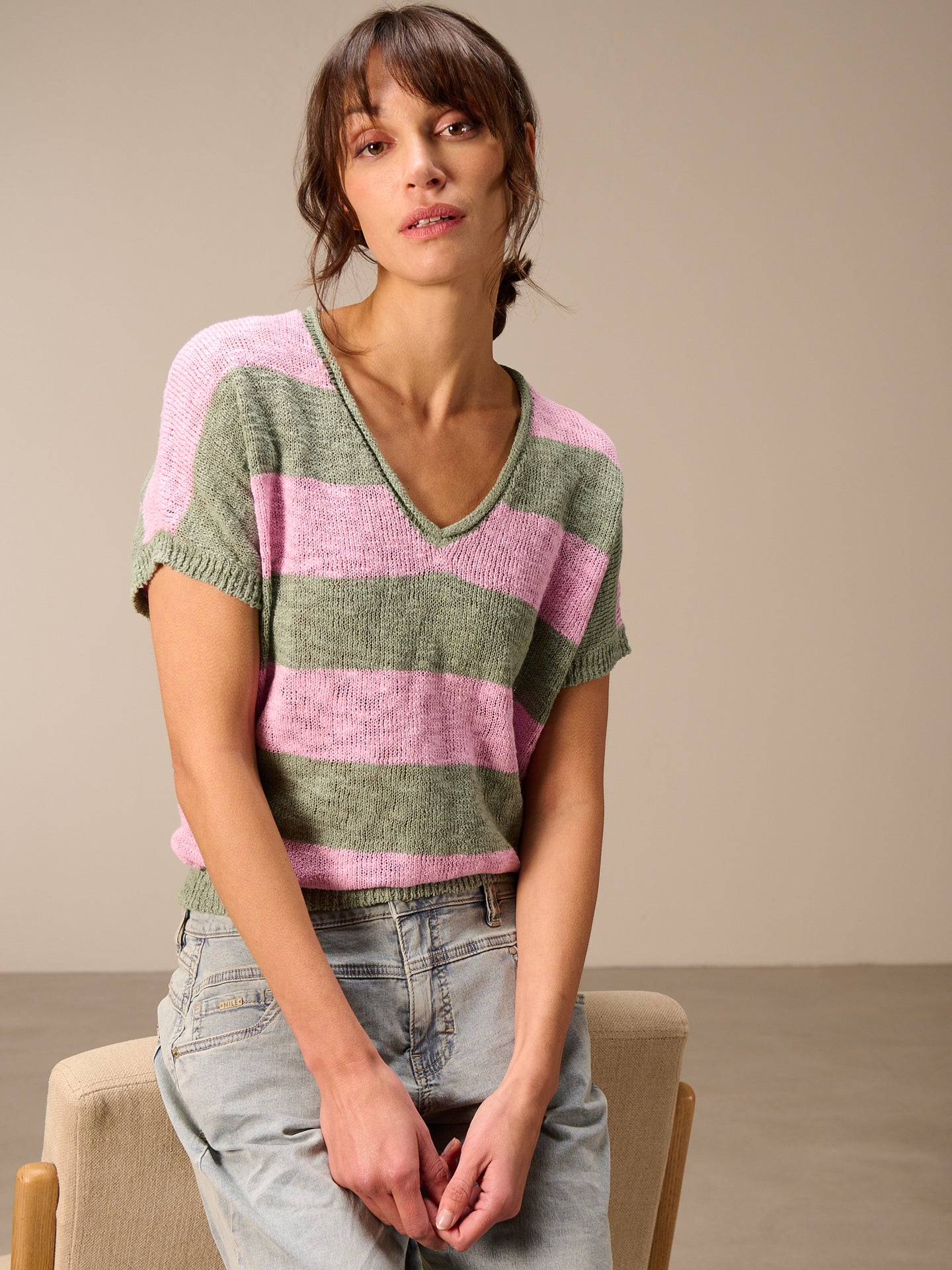 Smanicato con scollo a V