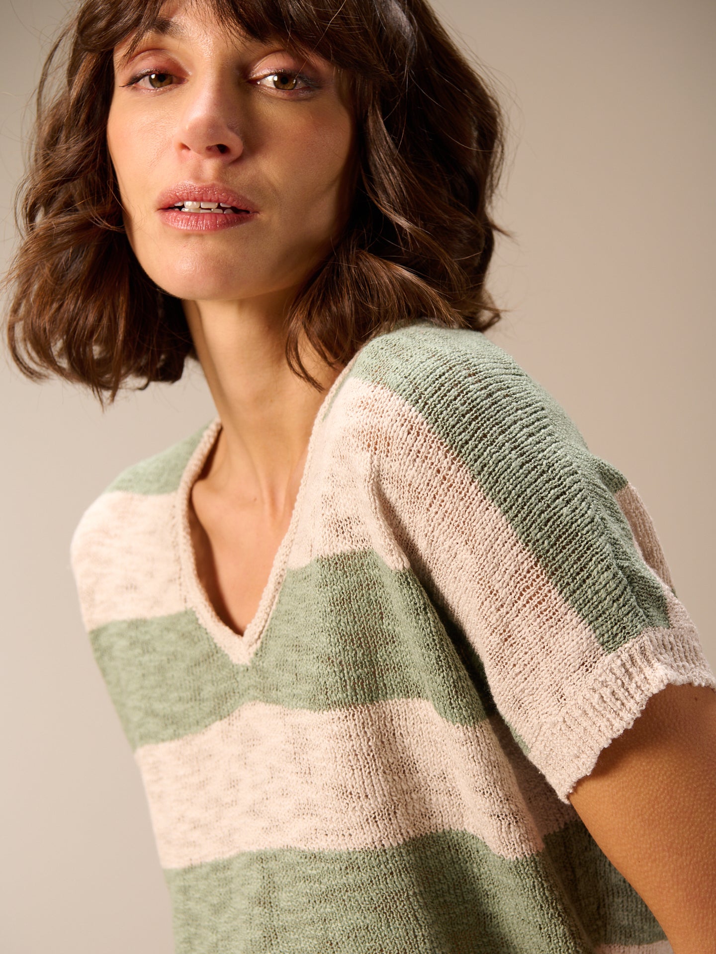 Smanicato con scollo a V