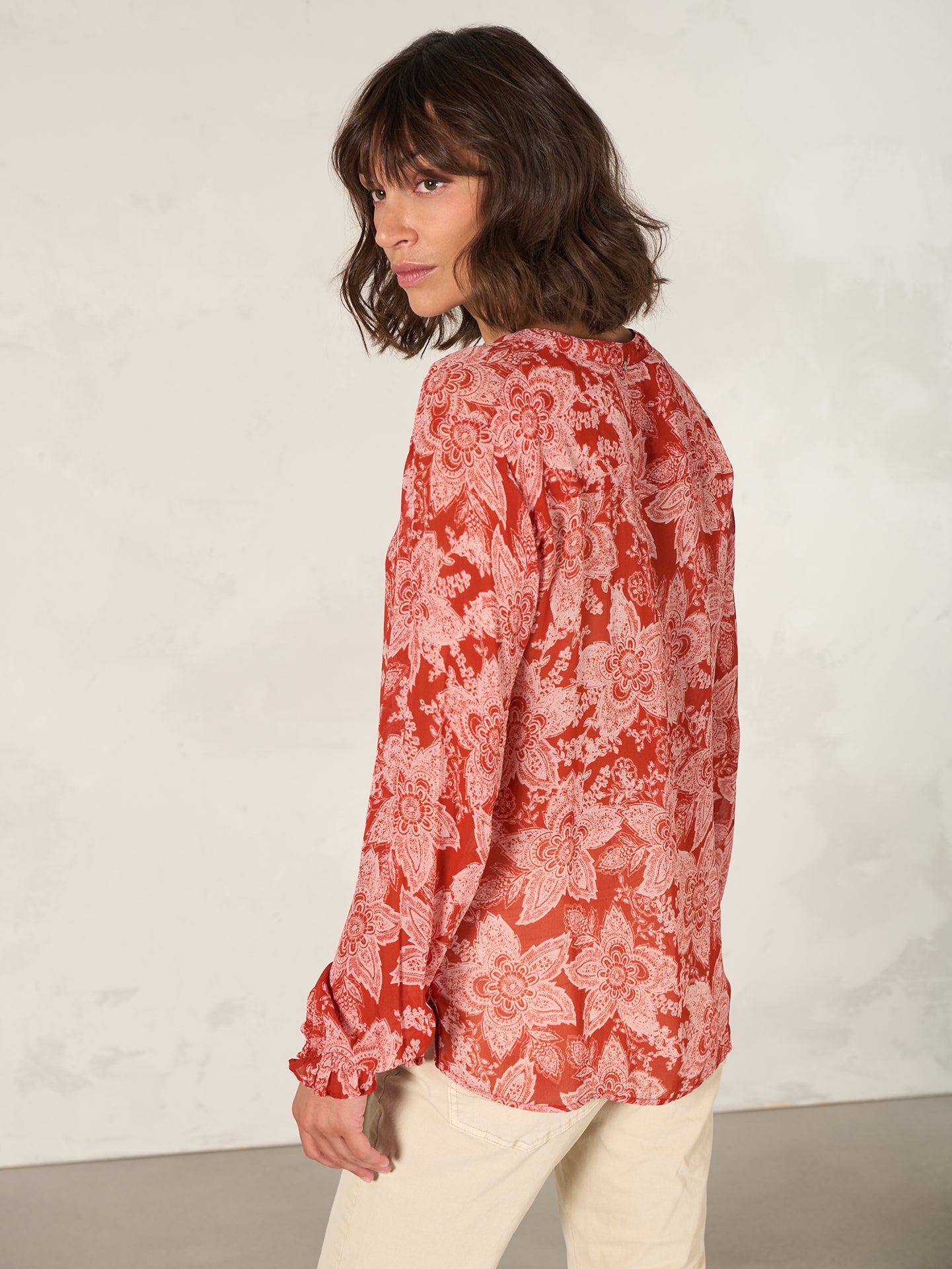 Blouse with button placket