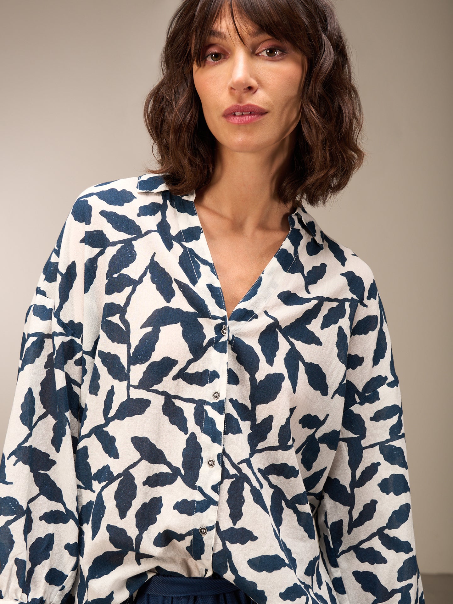 Blouse with button placket