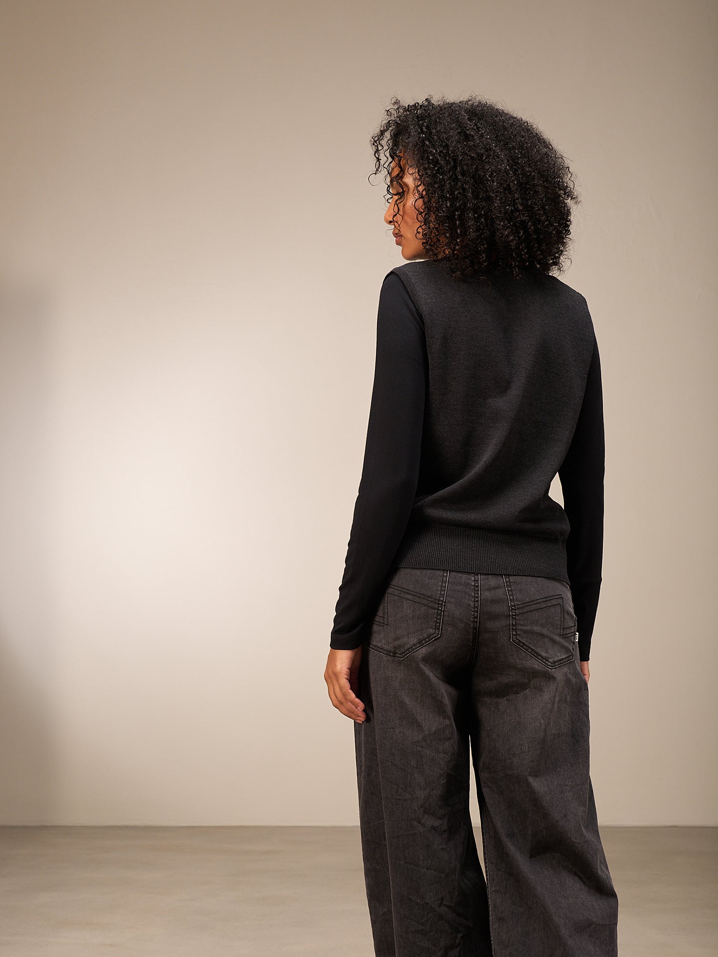 Smanicato con chiusura con bottoni