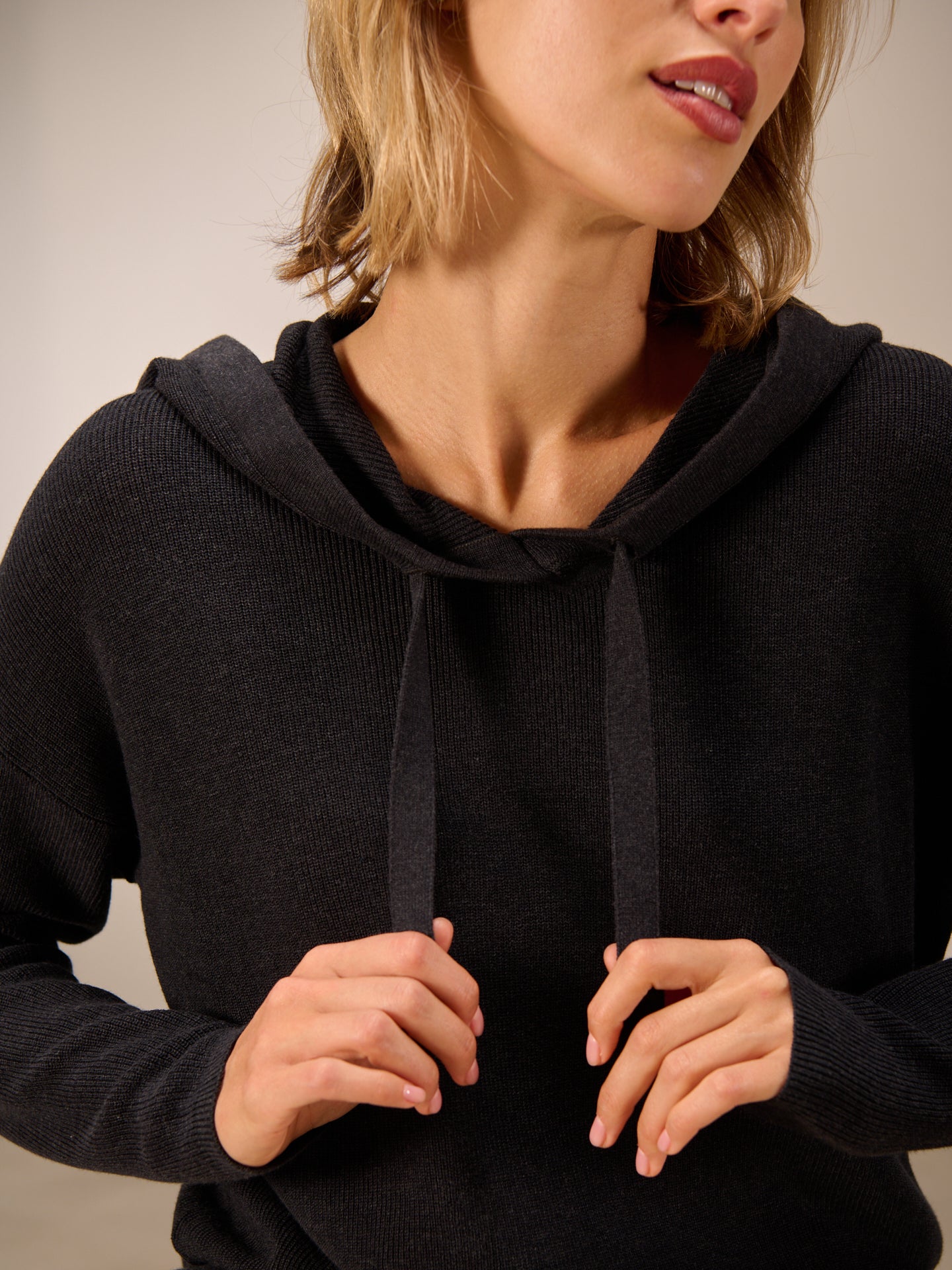 Maglione con cappuccio