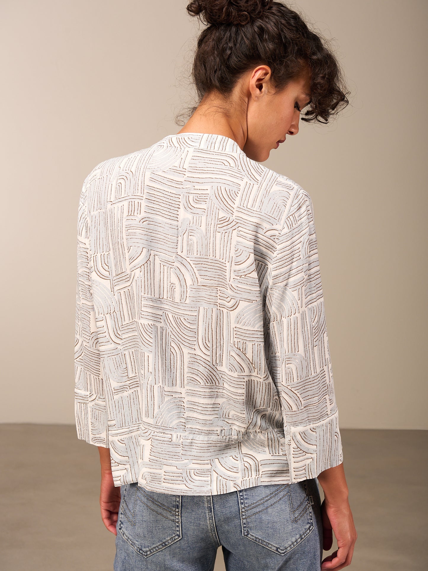 Blusa con maniche a 3/4