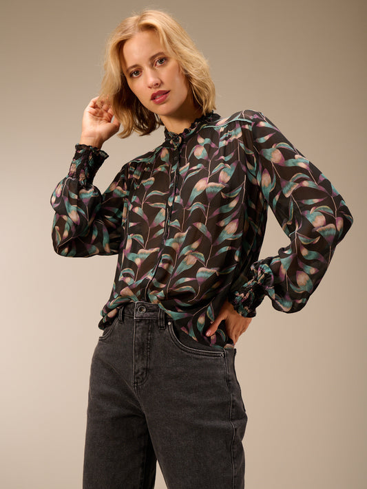 Blusa con dettaglio a balze