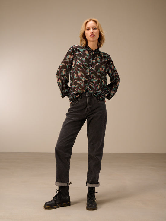 Blusa con dettaglio a balze