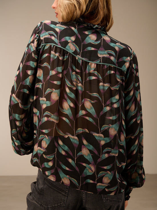 Blusa con dettaglio a balze