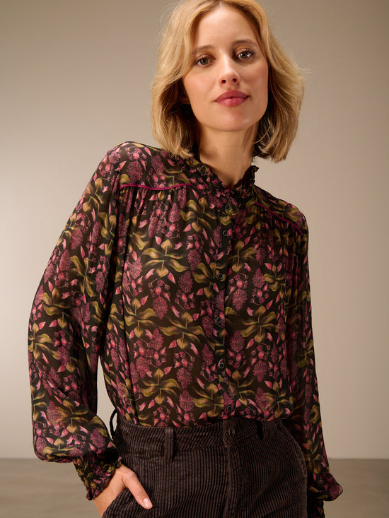 Blusa con dettaglio a balze