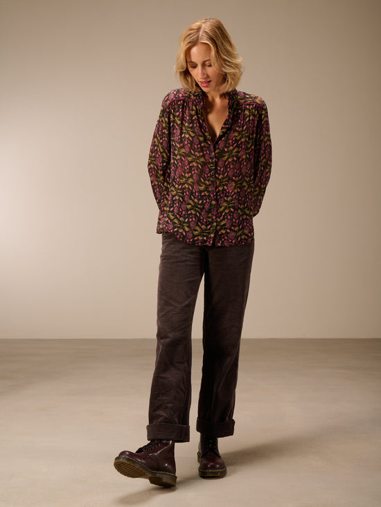 Blusa con dettaglio a balze