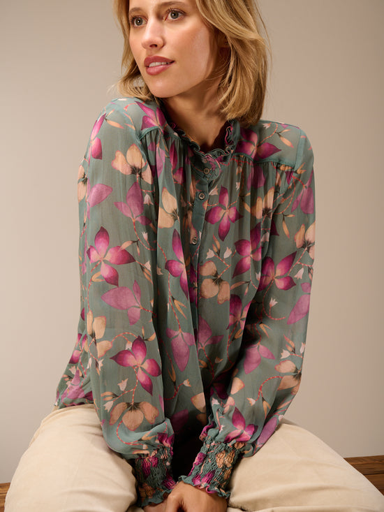Blusa con dettaglio a balze