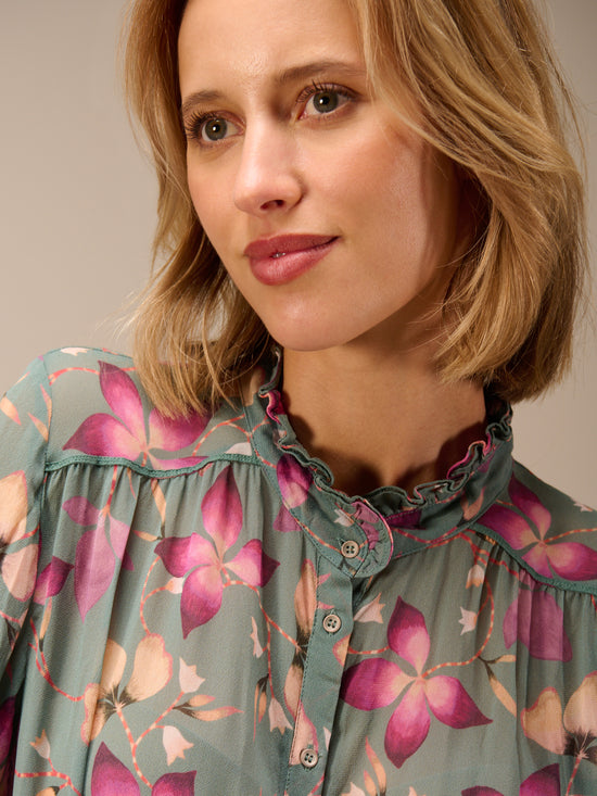 Blusa con dettaglio a balze