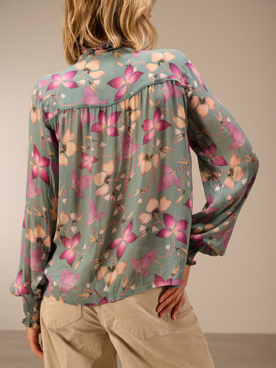 Blusa con dettaglio a balze