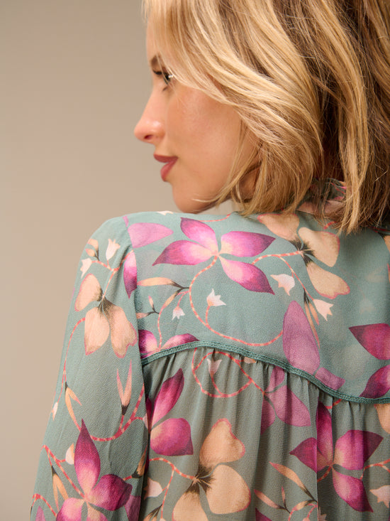 Blusa con dettaglio a balze