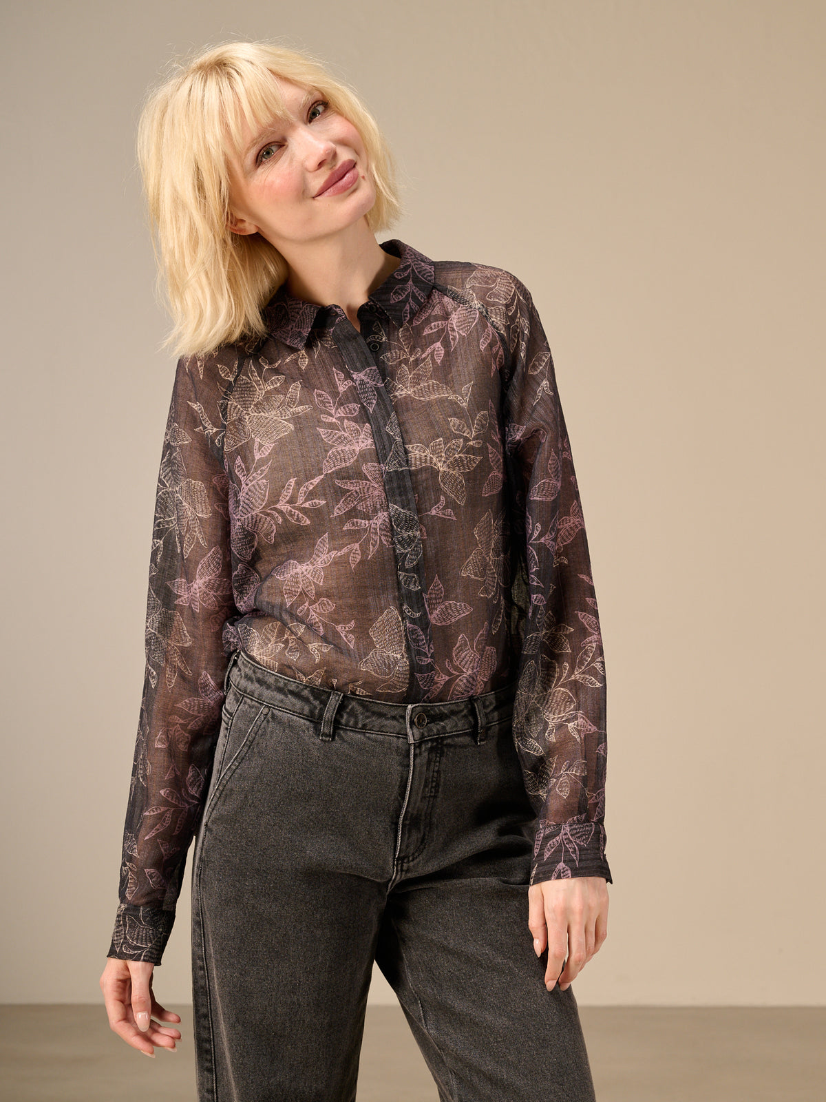 Blusa con abbottonatura