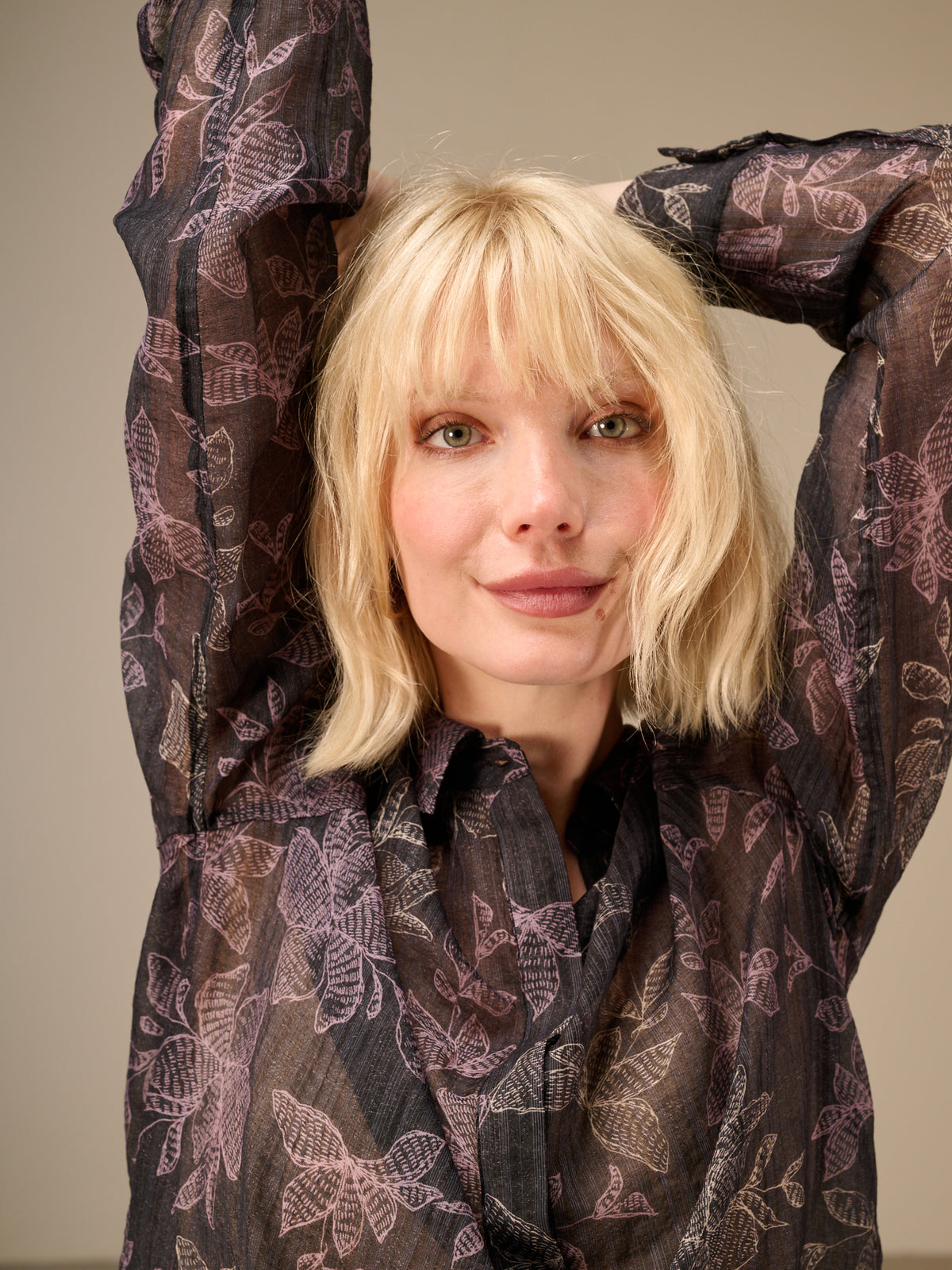 Blusa con abbottonatura