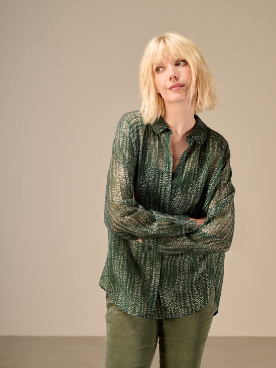 Blusa con abbottonatura