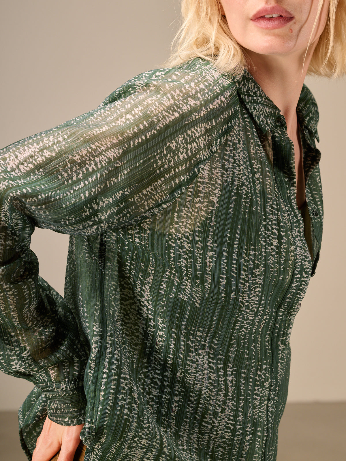 Blusa con abbottonatura