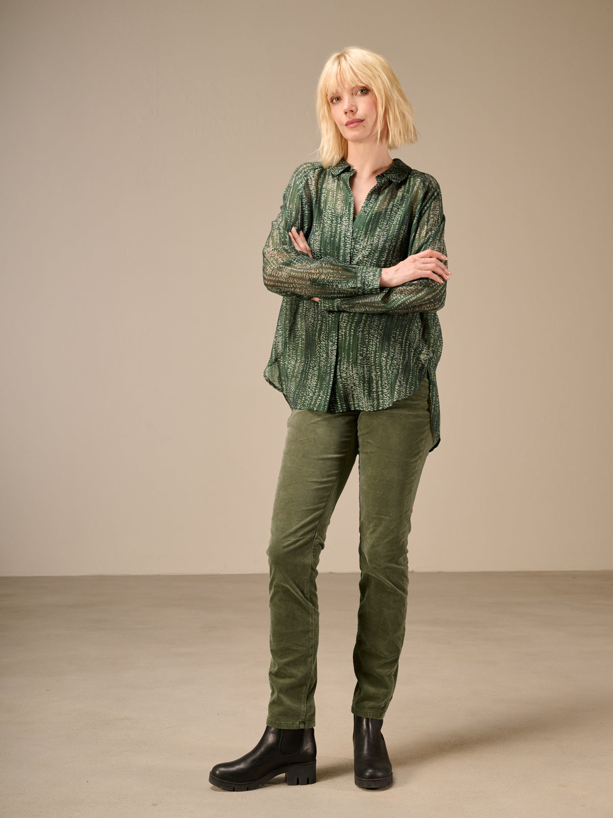 Blusa con abbottonatura