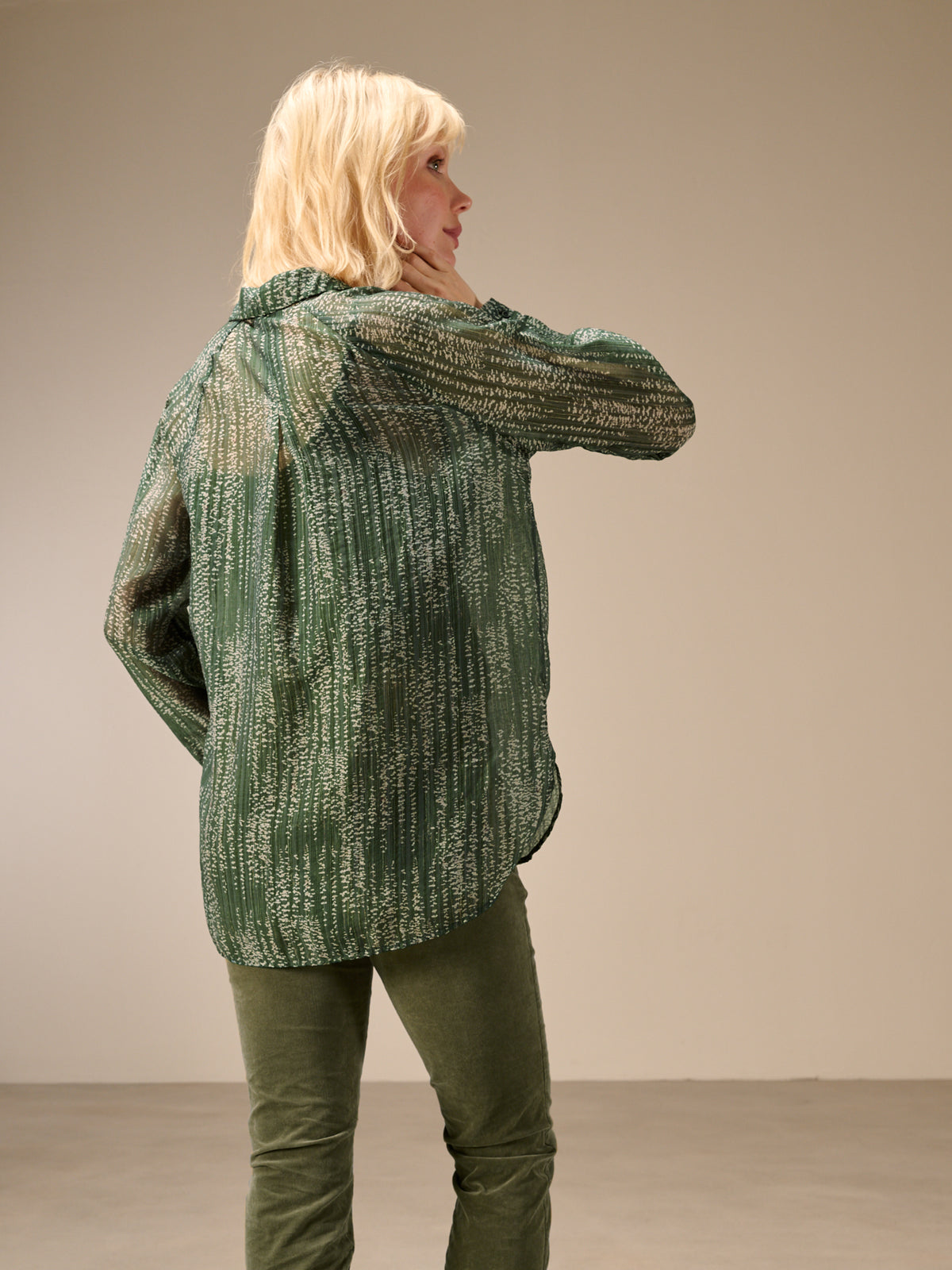 Blusa con abbottonatura